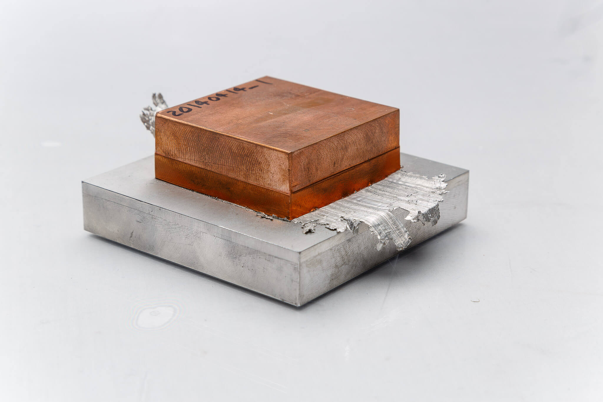 Bi-metallic application linear friction welding of copper alloy block to aluminum plate 
